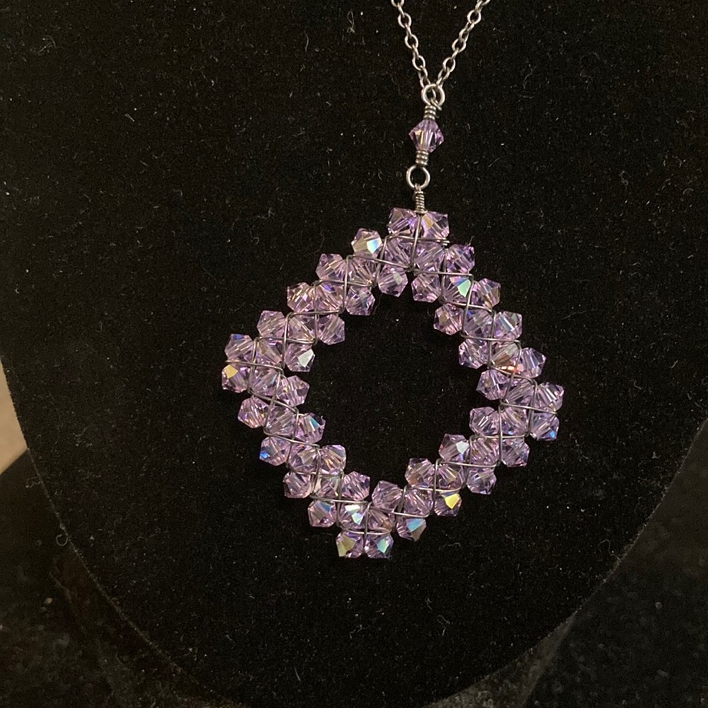 Gorgeous light catching diamond design beaded pendant on 925 blackish chain